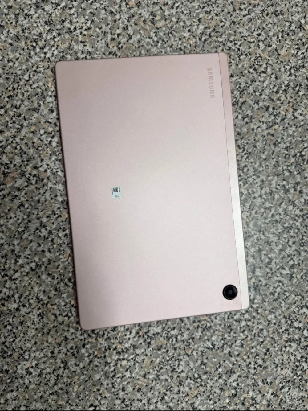 Samsung Tablet with Black Bezel and Blue Accent Display